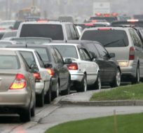 Canadians spend too much money and time on infrastructure and people spend more time in traffic, two things that stifle growth. J.P. Moczulski/The Canadian Press.