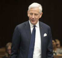 Dominic Barton waits to appear before the House of Commons committee on Canada-China relations in Ottawa on February 5, 2020. Adrian Wyld/The Canadian Press.