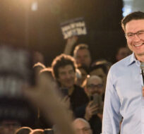 Conservative Leader Pierre Poilievre speaks to the crowd gathered at a meet-and-greet at Grand Olympia Hospitality and Convention Centre in Stoney Creek, Ont., on Saturday, March 4, 2023. Alex Lupul/The Canadian Press. 