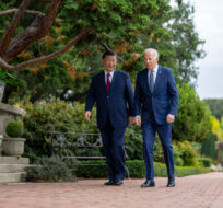 President Joe Biden and China's President President Xi Jinping walk in the gardens at the Filoli Estate in Woodside, Calif., Wednesday, Nov, 15, 2023, on the sidelines of the Asia-Pacific Economic Cooperative conference. (Doug Mills/The New York Times via AP.