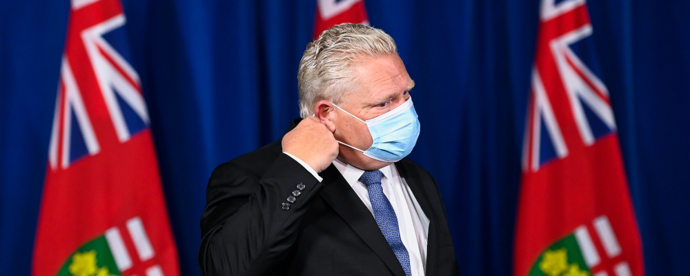 Ontario Premier Doug Ford arrives for a press conference during the COVID-19 pandemic in Toronto, Friday, November 20, 2020. Nathan Denette/The Canadian Press. 