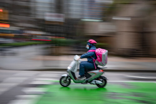 A food delivery worker rides an electric bike in downtown Vancouver, on Tuesday, January 12, 2021. Darryl Dyck?The Canadian Press. 