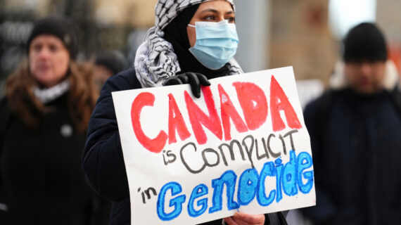 People protest in front of Parliament Hill in Ottawa on Wednesday, Nov. 8, 2023. Sean Kilpatrick/The Canadian Press. 